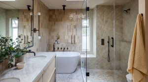 2026 Bathroom Trends- warm neutrals, matte metals, textured stone